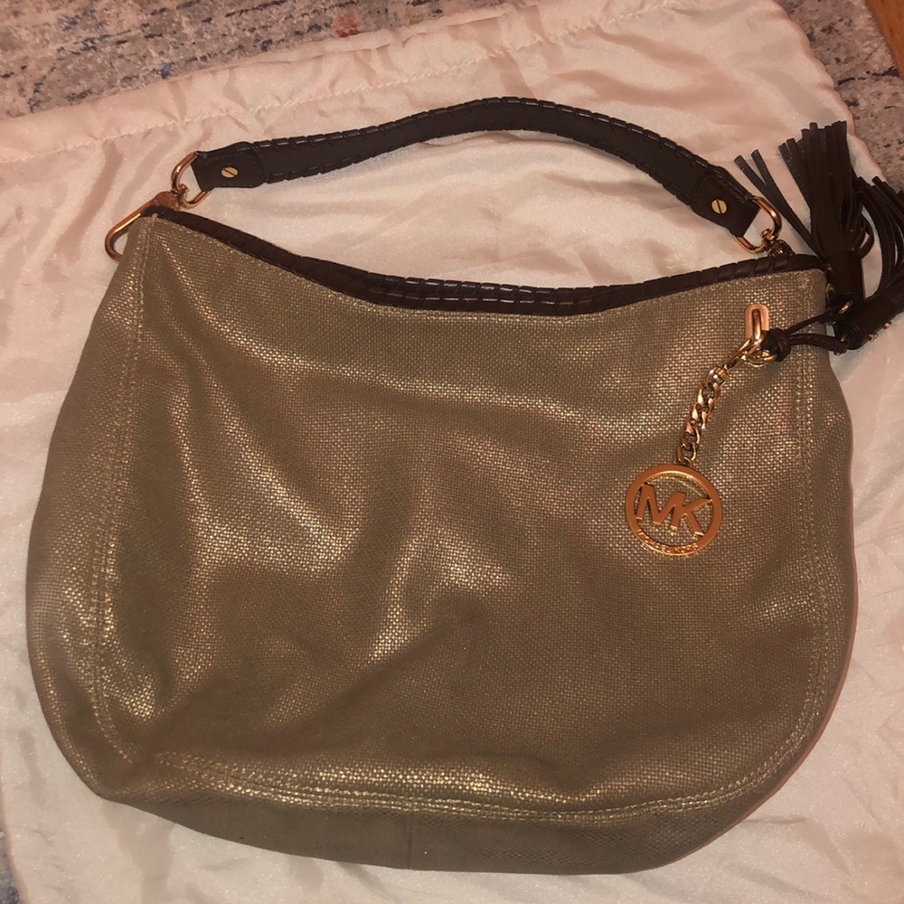Gold and brown leather Michael Kors bag.